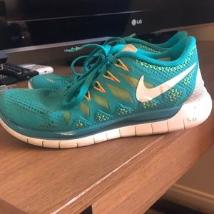 Teal Nike Free Runs
